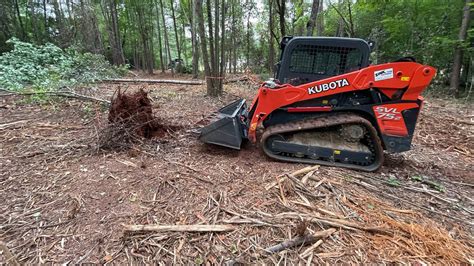 kubota skid steer land clearing|Clearing lot for a new home with a Kubota Skid Steer! .